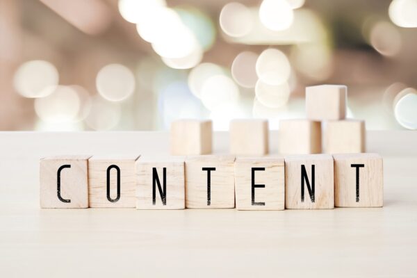 Content word on wooden cubes background, digital marketing concept