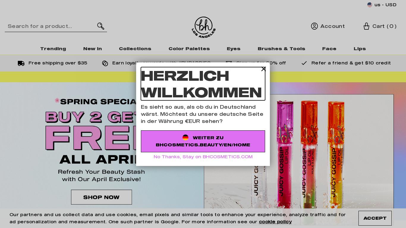 The text appears to be advertising cosmetic products, including a 35 color pressed pigment palette, a mini brush set, false lash mascara, fine brow pencils, and blush quads. The website offers international shipping and rewards points for completing orders. There are multiple prompts to switch to a German language and currency site.